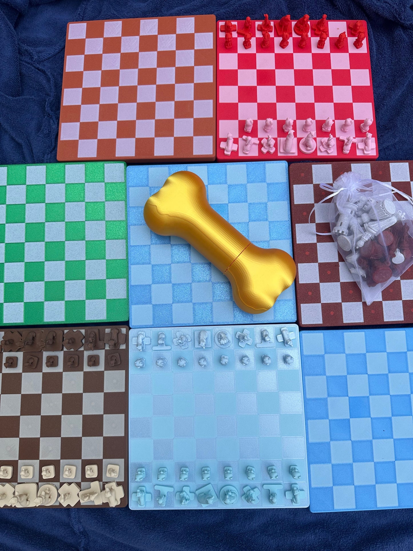 A collection of chessboards in Burnt Orange, crimson red, red, green, blue, winter, and brown