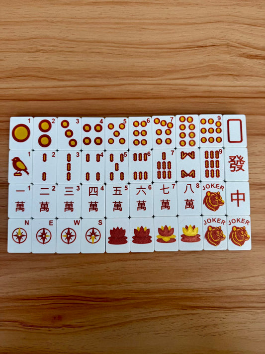 Set of Lightweight Travel Mahjong tiles on a wooden surface