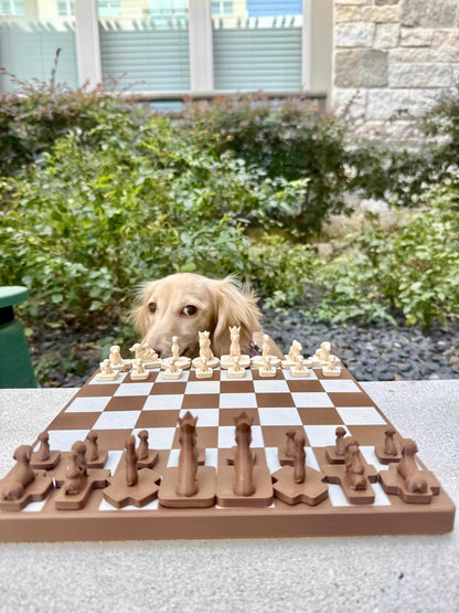 Wienerdog Chess set with magnetic dachshund chess pieces in brown and cream, with a dachshund dog looking over the board