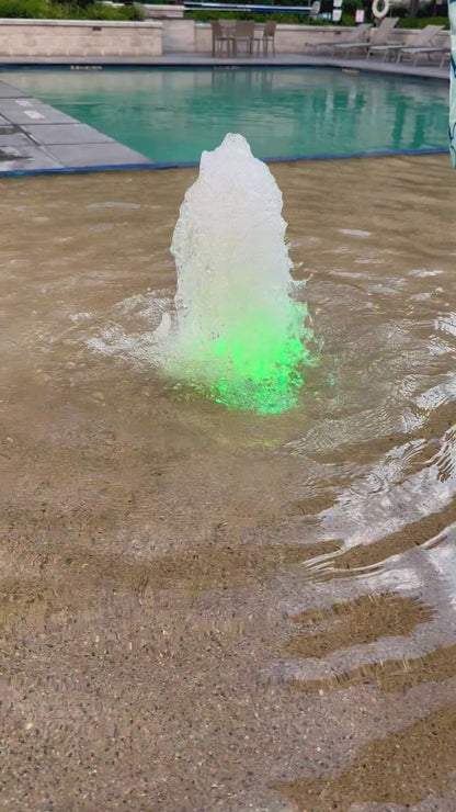 A video of american mahjong tiles floating and being waterproof for poolside play through a fountain